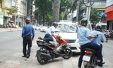 Cán bộ đô thị quận 1, TP HCM trong một lần xử lý vi phạm - Ảnh minh hoạ