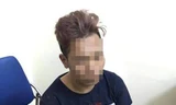Nghi can H. bị đưa về trụ sở công an để tiếp tục làm rõ