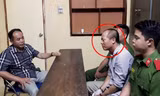 Đại tá Nguyễn Thanh Tùng thẩm vấn bị can Đông