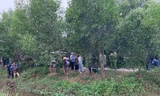 Công an khám nghiệm hiện trường nơi phát hiện nam thanh niên tử vong. Ảnh: An Bình