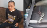 Đối tượng Đậu Đức Thuận (trú phường Hưng Bình, TP Vinh) và khẩu súng tang vật. Ảnh: Công an TP Vinh cung cấp (Dân trí)