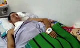 Nạn nhân được vợ đưa vào cấp cứu ở bệnh viện sau khi bị hành hung.