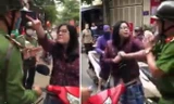 Người phụ nữ chửi bới, tấn công tổ công tác Công an phường Giáp Bát sau khi bị yêu cầu kiểm tra hành chính vì vi phạm giao thông. Ảnh cắt từ clip