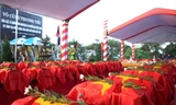 Trọng thể an táng 96 hài cốt liệt sĩ, quân tình nguyện và chuyên gia Việt Nam hy sinh tại CHDCND Lào