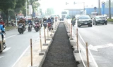 Xén dải phân cách nút Ngã Tư Sở và nhiều tuyến đường giảm ùn tắc 