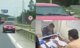 Chiếc xe ô tô đi ngược chiều và nam tài xế làm việc với CSGT.