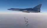 Tu-22M3 không kích IS ở Syria. Ảnh: Tass.