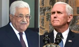 Tổng thống Palestine Mahmoud Abbas và phó Tổng thống Mỹ Mike Pence. Ảnh: AFP.