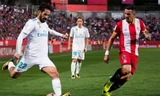 Isco (trái) đang có phong độ tốt trong màu áo Real. Ảnh:Marca.