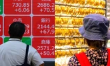 Giá vàng thế giới rơi tự do, chứng khoán liên tục nhảy múa