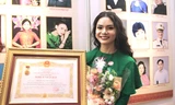 Nữ ca sĩ trẻ nhất đi nhận danh hiệu NSND