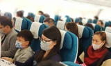 100% hành khách sử dụng khẩu trang trên máy bay. Ảnh: M.Đ