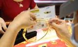 Đầu tuần, giá vàng giảm sâu, rơi khỏi ngưỡng 60 triệu đồng/lượng. ảnh Như Ý 