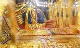 Giá USD tăng vọt, vàng trong nước neo cao 