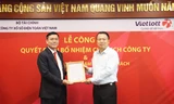 Thứ trưởng Bộ Tài chính Nguyễn Đức Chi trao quyết định bổ nhiệm Chủ tịch Công ty Xổ số Điện toán Việt Nam cho ông Nguyễn Thanh Đạm. 