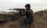 Một tay súng thuộc lực lượng chính phủ Syria.
