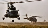 Trực thăng Mi-17 (trái) của không quân Iraq