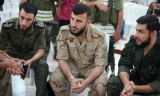 Zahran Alloush (giữa) - Thủ lĩnh Jaysh al-Islam đối lập ở Syria vừa bị tiêu diệt.