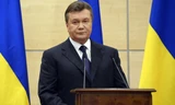 Ông Viktor Yanukovych tại buổi họp báo diễn ra chiều nay, 11/3 