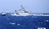 Tàu Hải cảnh Trung Quốc đe dọa tàu Việt Nam tại khu vực gần giàn khoan trái phép Hải Dương 981 (Nguồn: TTXVN)
