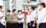 Thủ tướng trao đổi với Bí thư Thành ủy TPHCM Nguyễn Văn Nên và các lãnh đạo TPHCM về tăng cường các biện pháp phòng chống dịch tại TPHCM