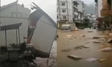 Lũ lụt chết người phá hủy nhà cửa, cuốn trôi xe cộ tại Trung Quốc