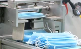 Tăng ca sản xuất khẩu trang phòng dịch virus corona