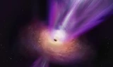 Một hố đen cổ đại đang nhảy múa ngoạn mục với các thiên hà 
