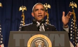 Tổng thống Mỹ Barack Obama phát biểu trước các nghị sỹ đảng Dân chủ tại thành phố Philadelphia ngày 30/1. Nguồn: AFP/TTXVN