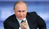 Tổng thống Nga Vladimir Putin trả lời phỏng vấn tại cuộc họp báo. (Nguồn: AFP)