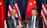 Tổng thống Mỹ Barack Obama (trái) và Chủ tịch Trung Quốc Tập Cận Bình trong cuộc hội đàm bên lề Hội nghị COP 21. (Nguồn: THX/TTXVN)