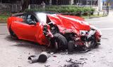 Ferrari 599 nát bét sau tai nạn. Ảnh: SCMP