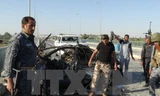 Hiện trường một vụ đánh bom tại Iraq. (Nguồn: AFP/TTXVN)
