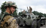 Binh sỹ Ukraine và Mỹ trong một cuộc tập trận. (Nguồn: AFP/TTXVN)