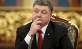 Tổng thống Ukraine Petro Poroshenko khẳng định không có tiếng súng trong suốt tuần qua ở miền Đông Nam nước này. Ảnh: Reuters