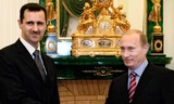 Tổng thống Nga Vladimir Putin (phải) sắp "buông" Syria?