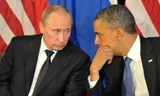Tổng thống Nga (trái) và Tổng thống Mỹ mong muốn sớm chấm dứt khủng hoảng tại Ukraine