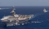 Tàu sân bay USS Theodore Roosevelt cùng tuần dương hạm USS Bunker Hill trên Thái Bình Dương. Ảnh: HẢI QUÂN MỸ
