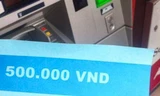 Hình ảnh tờ giấy in chữ 500 nghìn đồng.