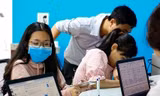 Phổ điểm thi tốt nghiệp tăng, điểm chuẩn vào các trường đại học ra sao?