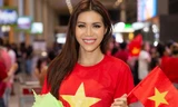 Vừa về tới sân bay, Minh Tú mặc áo cờ đỏ sao vàng cổ vũ tuyển Việt Nam