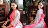 Hoa hậu Đỗ Thị Hà đẹp nền nã với áo dài hồng trong ngày mùng 5 Tết