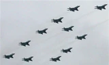 Chiến đấu cơ Mig xếp đội hình. Ảnh: AFP.