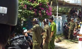 Cơ quan chức năng khám nghiệm hiện trường. Ảnh: Dân Trí