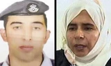 Phi công Jordan Muath al-Kaseasbe (trái) và Sajida al-Rishawi, một nữ tù nhân Iraq đang bị giam ở Jordan. Ảnh: AP.
