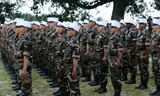 Mọi công dân nước ngoài đều có cơ hội đứng trong hàng ngũ đơn vị miễn là họ vượt qua được kỳ sát hạch. Ảnh: AFP.