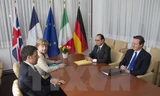Thủ tướng Italy Matteo Renzi, Thủ tướng Đức Angela Merkel, Tổng thống Pháp Francois Hollande và Thủ tướng Anh David Cameron tại hội nghị bất thường EU ở Brussels. Nguồn: AFP/TTXVN.