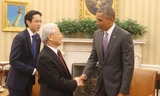 Tổng thống Mỹ Barack Obama đón Tổng Bí thư Nguyễn Phú Trọng tại Nhà Trắng. Ảnh: TTXVN.
