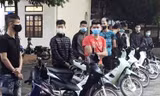 Các đối tượng tại cơ quan công an. Ảnh Công an TP Hà Nội