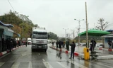 Lực lượng chức năng Việt Nam-Trung Quốc tăng cường kiểm tra y tế qua cửa khẩu Lạng Sơn Ảnh: Duy Chiến 